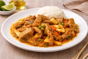plato de mondonguito a la italiana con arroz