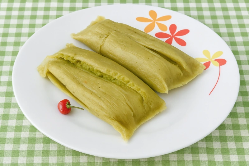 deliciosos tamalitos verdes peruanos en hoja de maíz