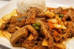 plato de mondonguito a la italiana con arroz